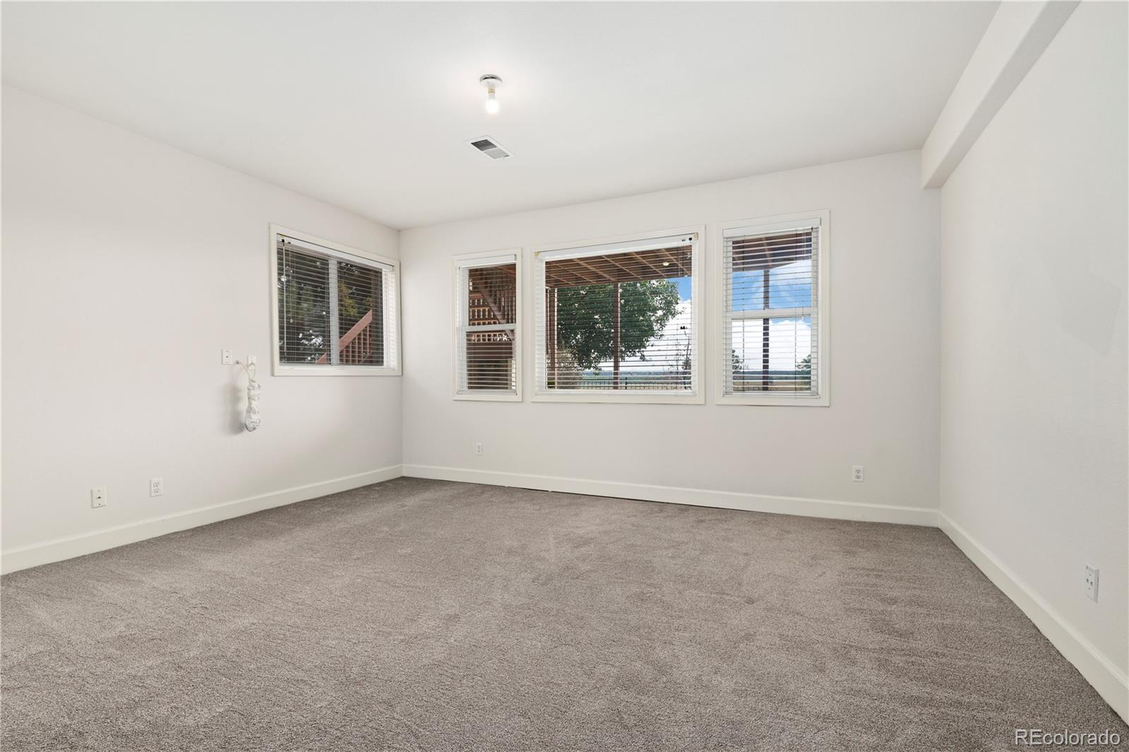 5662 South Nome Street Englewood, CO 80111 - Photo 42 of 47 an empty room with windows