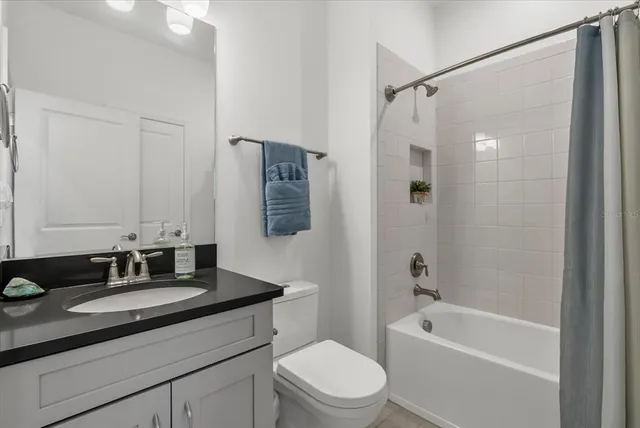 a view of empty room with windows