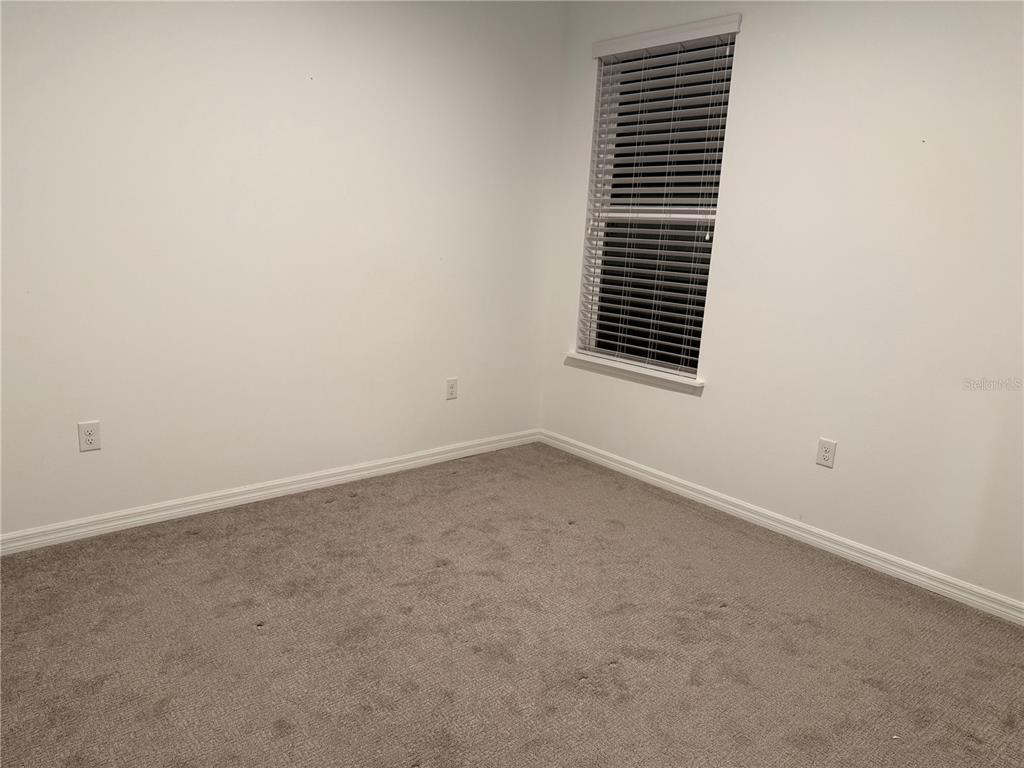 9291 Starry Night Avenue Sarasota, FL 34241 - Photo 19 of 30 an empty room with a window
