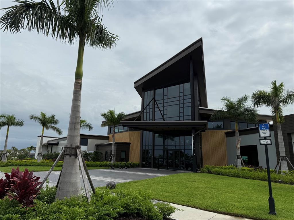 9291 Starry Night Avenue Sarasota, FL 34241 - Photo 22 of 30 a front view of a house with a garden