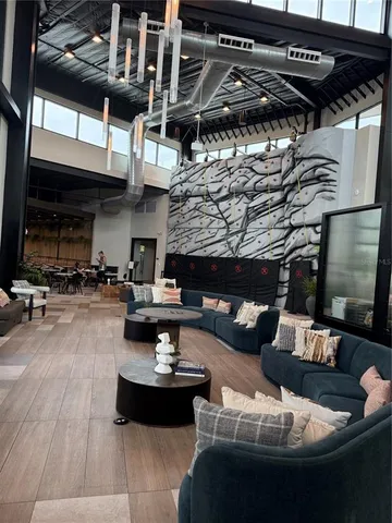 a view of a gym with wooden floor