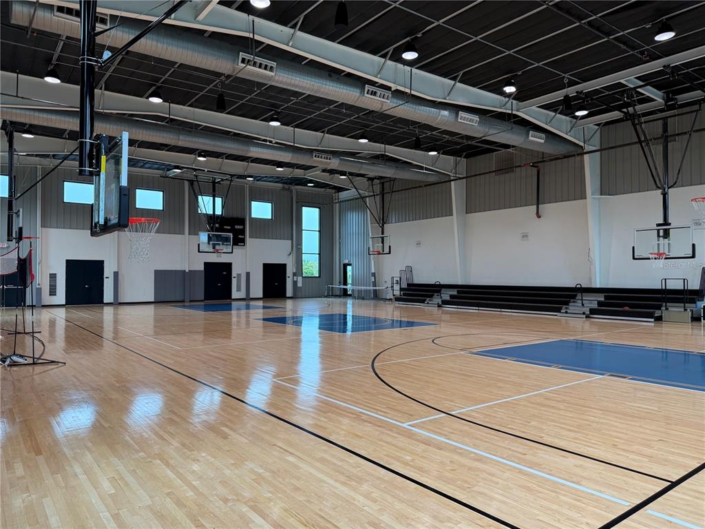 9291 Starry Night Avenue Sarasota, FL 34241 - Photo 27 of 30 a view of a gym with wooden floor