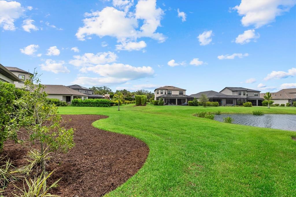 9291 Starry Night Avenue Sarasota, FL 34241 - Photo 5 of 30 a view of a green field