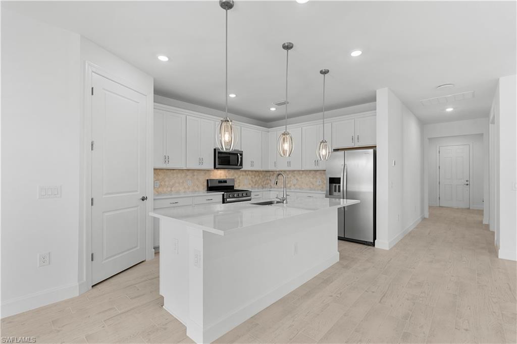 2104 Freemont Way Naples, FL 34119 - Photo 3 of 27 Sheek pendant lighting fixtures