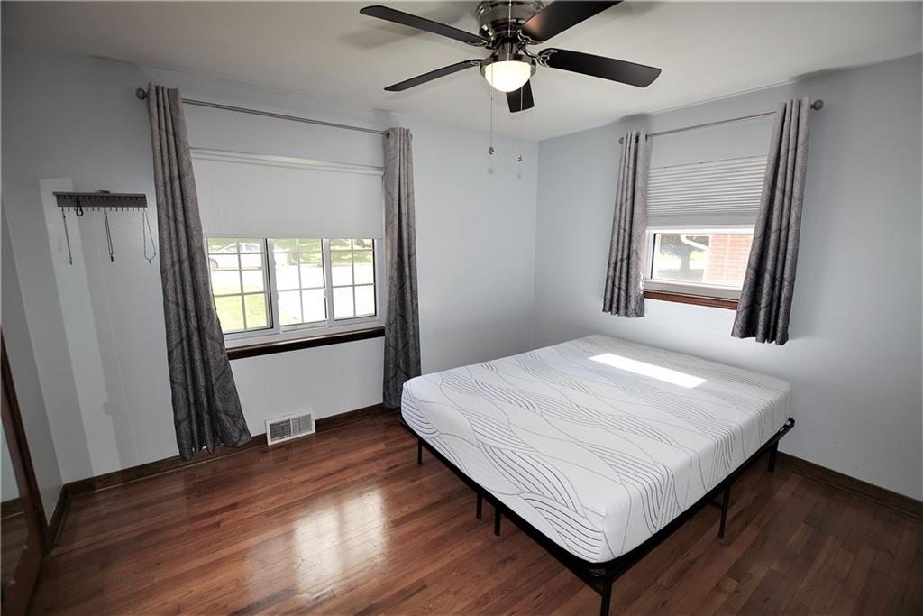 437 Greenridge Road New Kensington, PA 15068 - Photo 13 of 25 a bedroom with a bed and a window