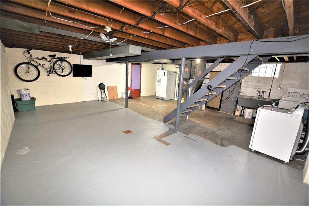 437 Greenridge Road New Kensington, PA 15068 - Photo 20 of 25 a view of a room with gym equipment