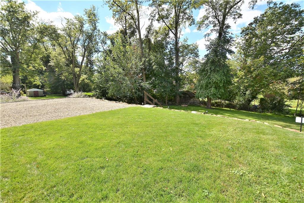 437 Greenridge Road New Kensington, PA 15068 - Photo 22 of 25 a view of a field of grass and trees