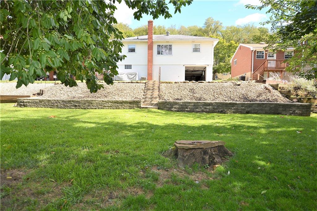 437 Greenridge Road New Kensington, PA 15068 - Photo 23 of 25 a view of a house with a yard