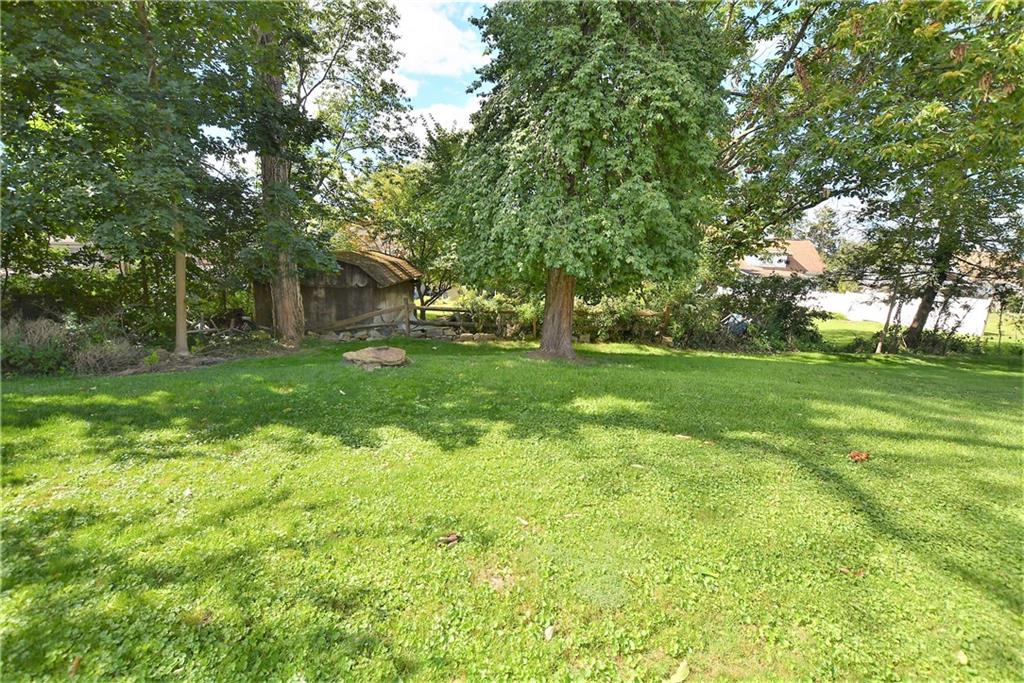 437 Greenridge Road New Kensington, PA 15068 - Photo 24 of 25 a view of a grassy field with trees