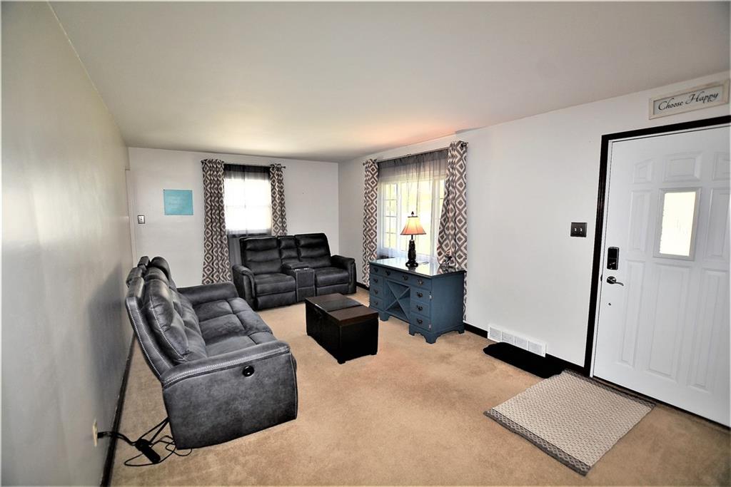 437 Greenridge Road New Kensington, PA 15068 - Photo 3 of 25 a living room with furniture and wooden floor