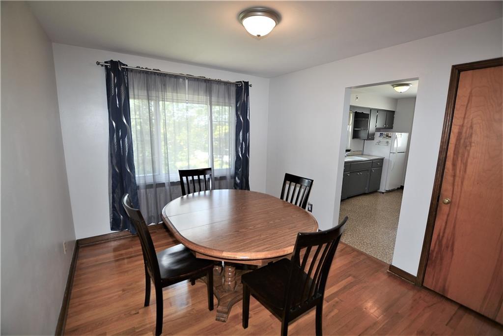 437 Greenridge Road New Kensington, PA 15068 - Photo 9 of 25 a view of a a dining room with furniture window and wooden floor
