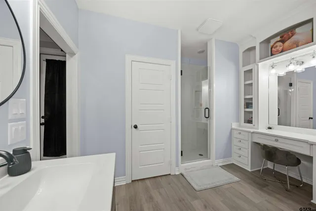 a view of a bedroom from the hallway