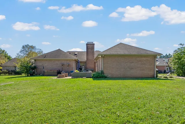 a view of a garden with houses