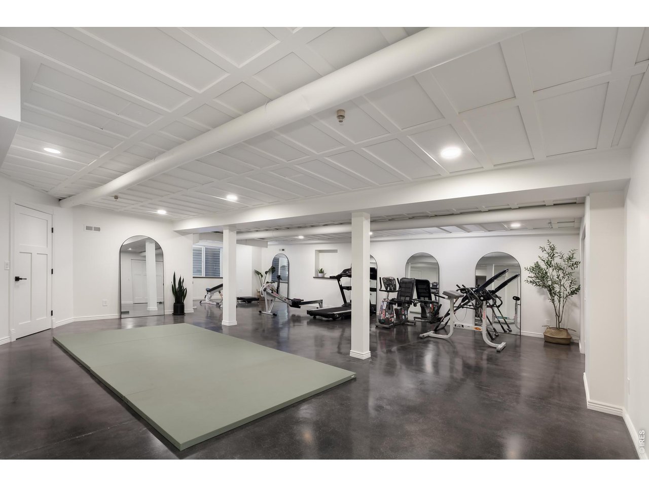5575 St Vrain Road Longmont, CO 80503 - Photo 40 of 50 Huge gym space with additional storage closets