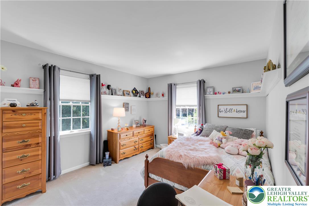 4059 Old Sentry Road Allentown, PA 18104 - Photo 23 of 39 Sun-filled bedroom featuring soft neutral tones and abundant natural light.