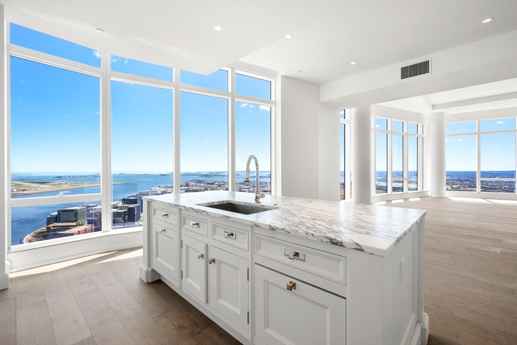 a kitchen with counter top space and sink