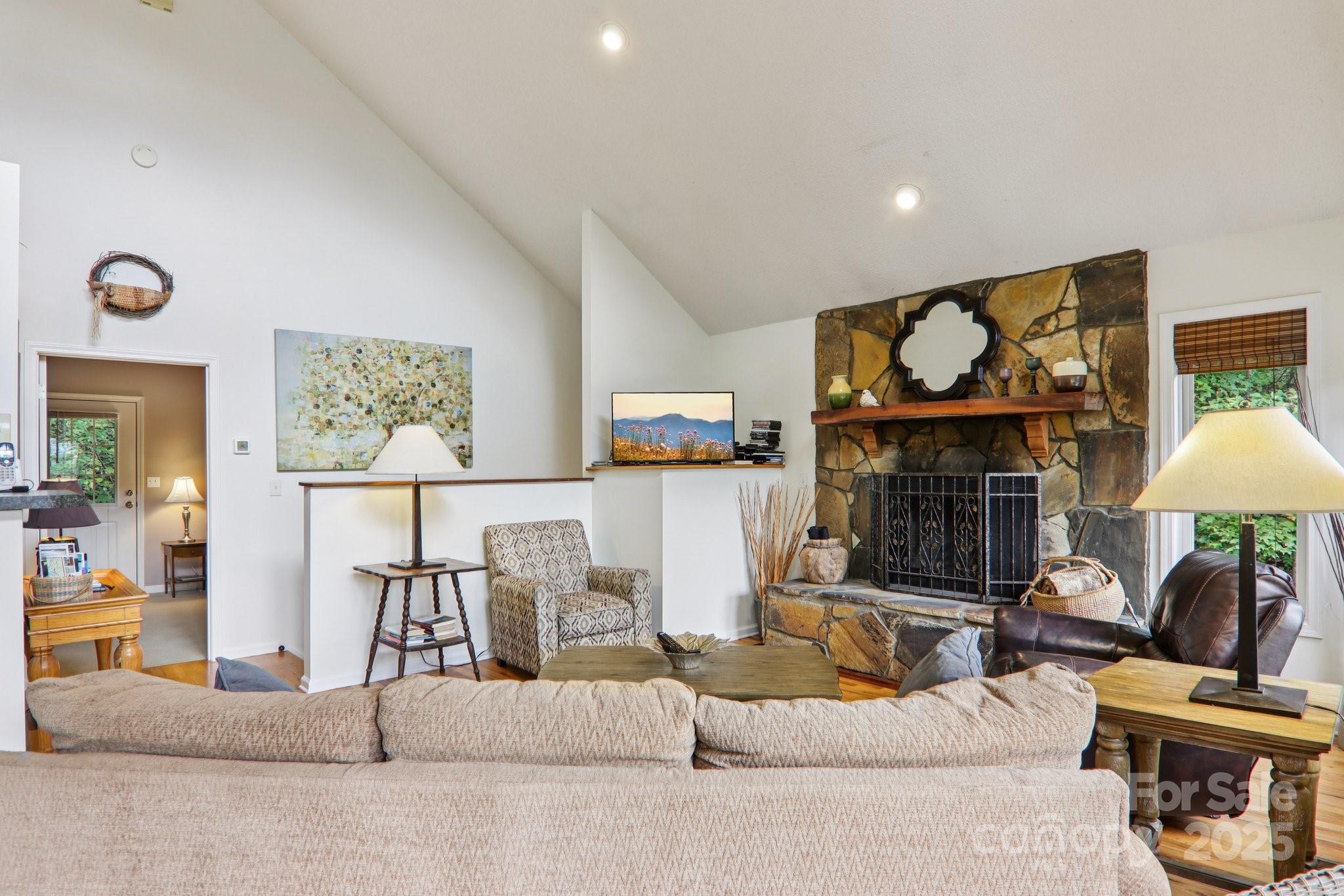 311 Jacks Knob Road Barnardsville, NC 28709 - Photo 11 of 48 a living room with furniture and a fireplace