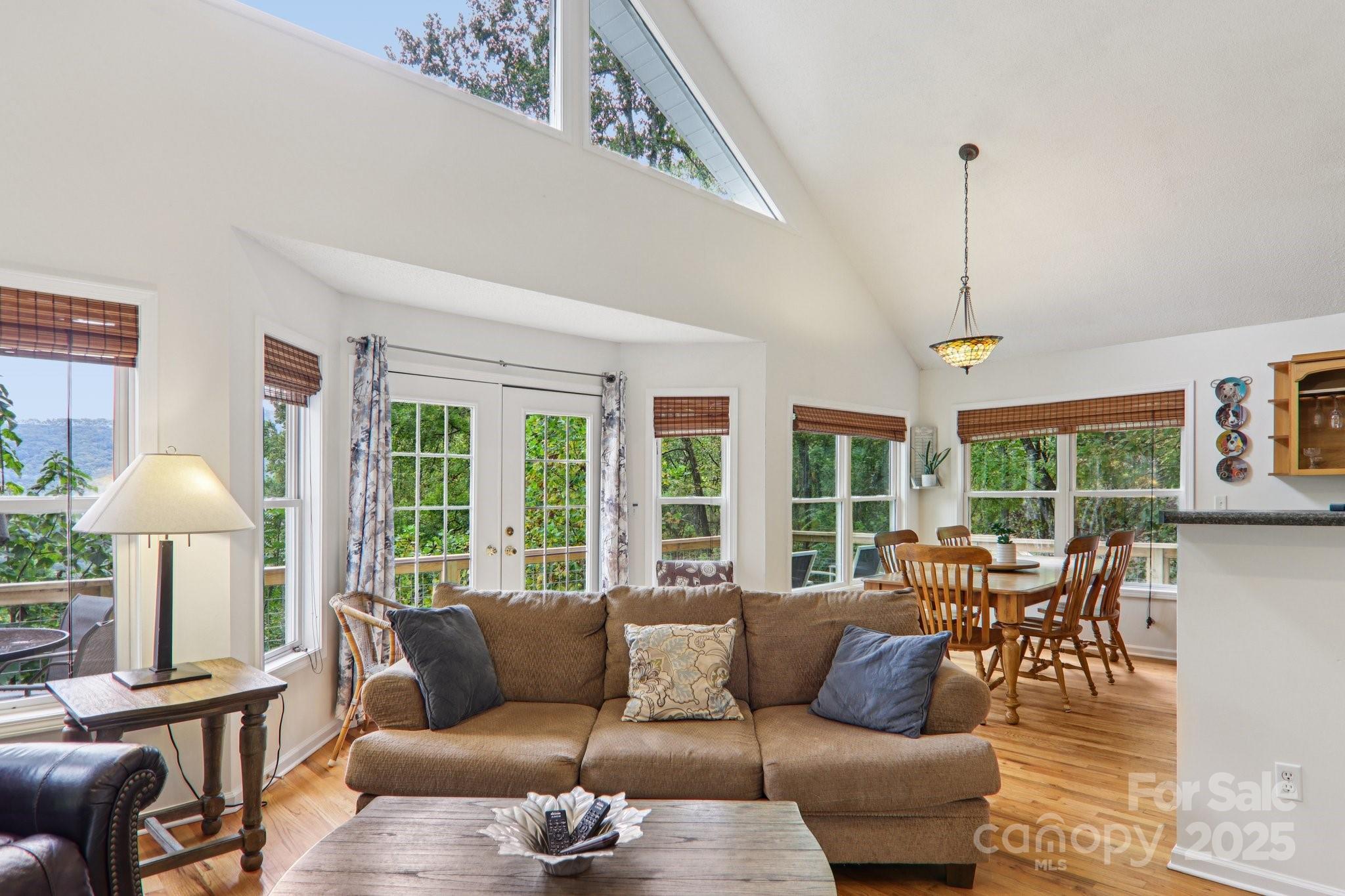 311 Jacks Knob Road Barnardsville, NC 28709 - Photo 16 of 48 a living room with furniture and a large window
