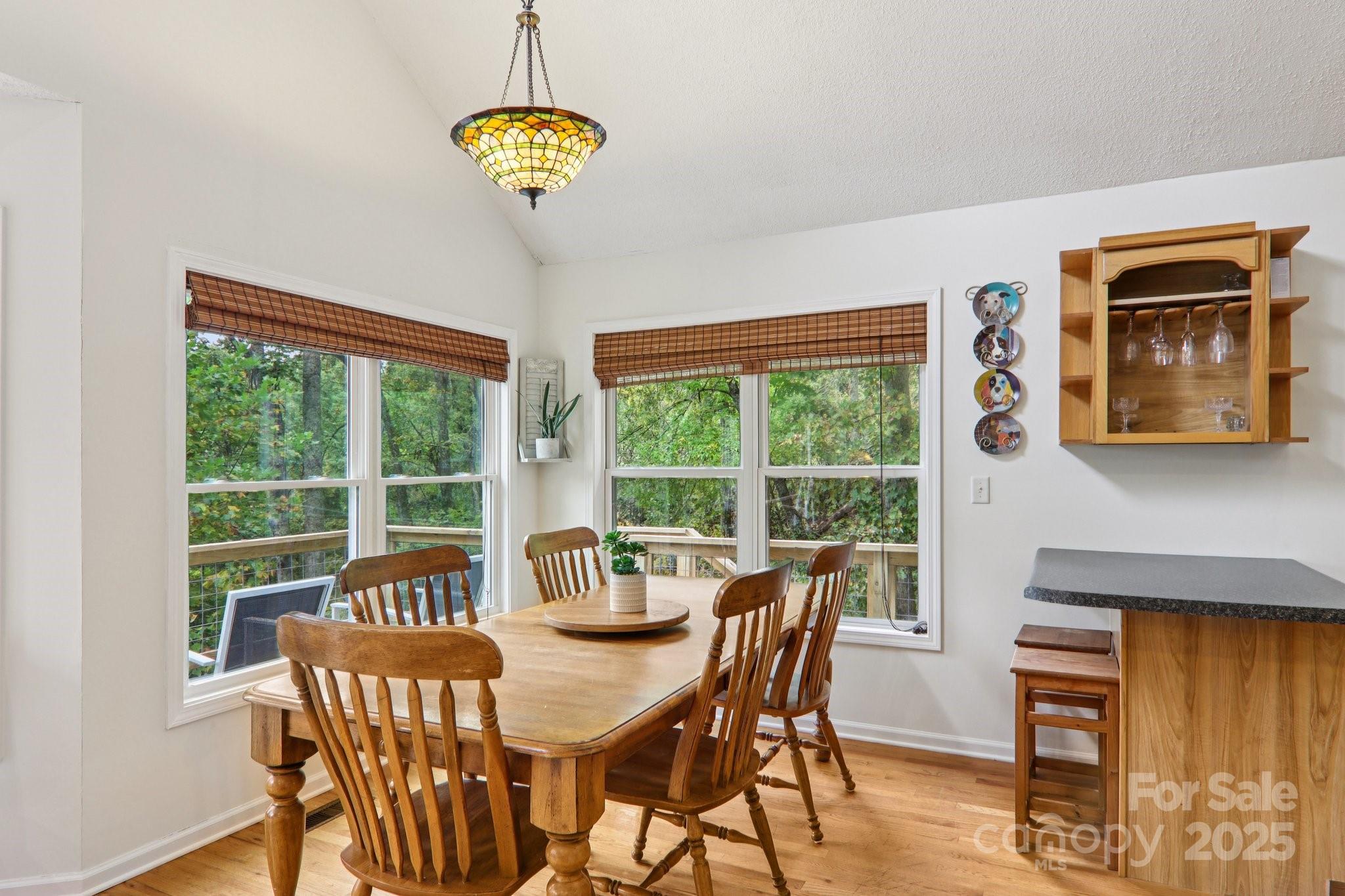 311 Jacks Knob Road Barnardsville, NC 28709 - Photo 18 of 48 a view of a dining room with furniture window and outside view