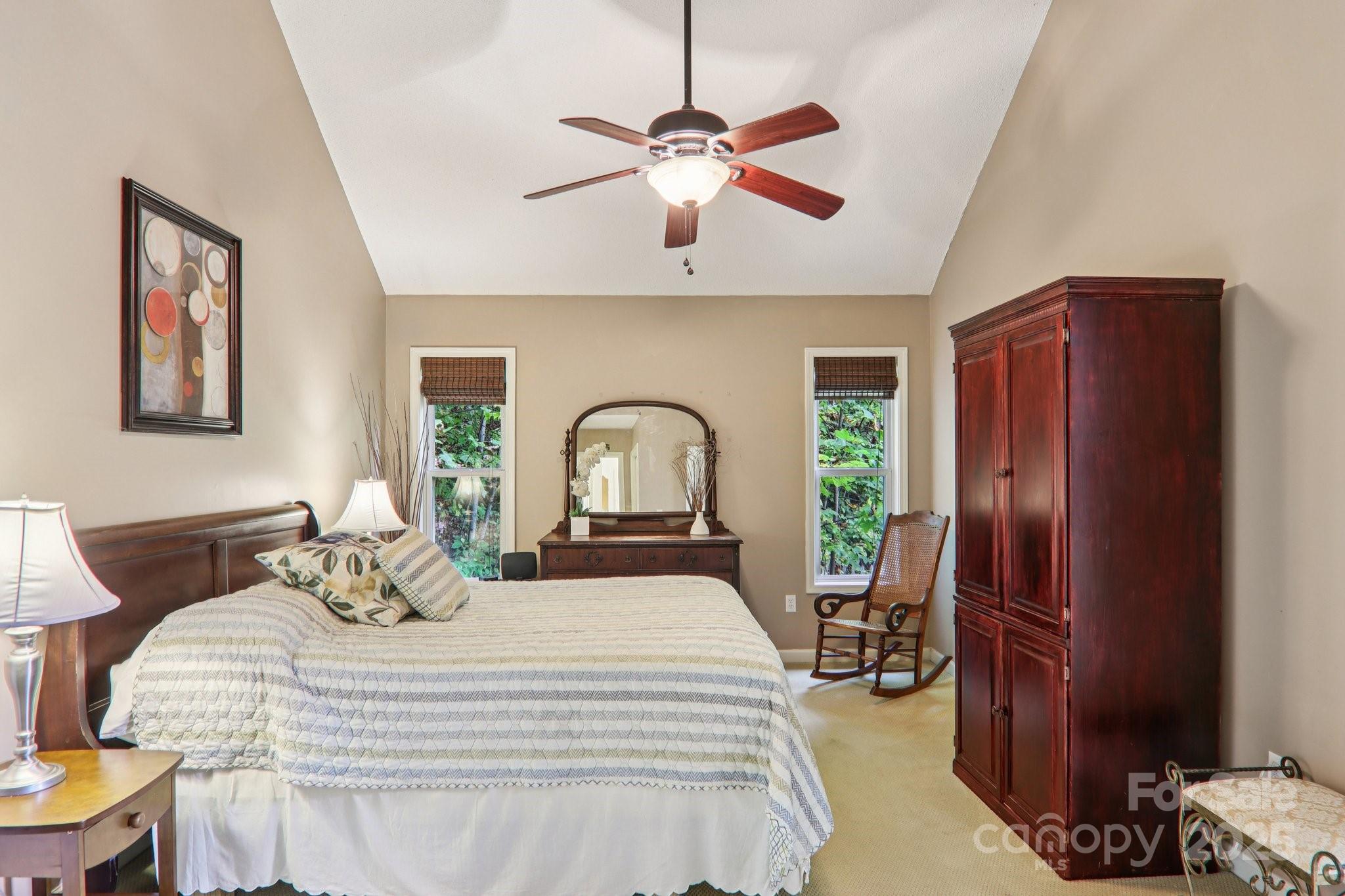 311 Jacks Knob Road Barnardsville, NC 28709 - Photo 31 of 48 a bedroom with a bed and wooden floor