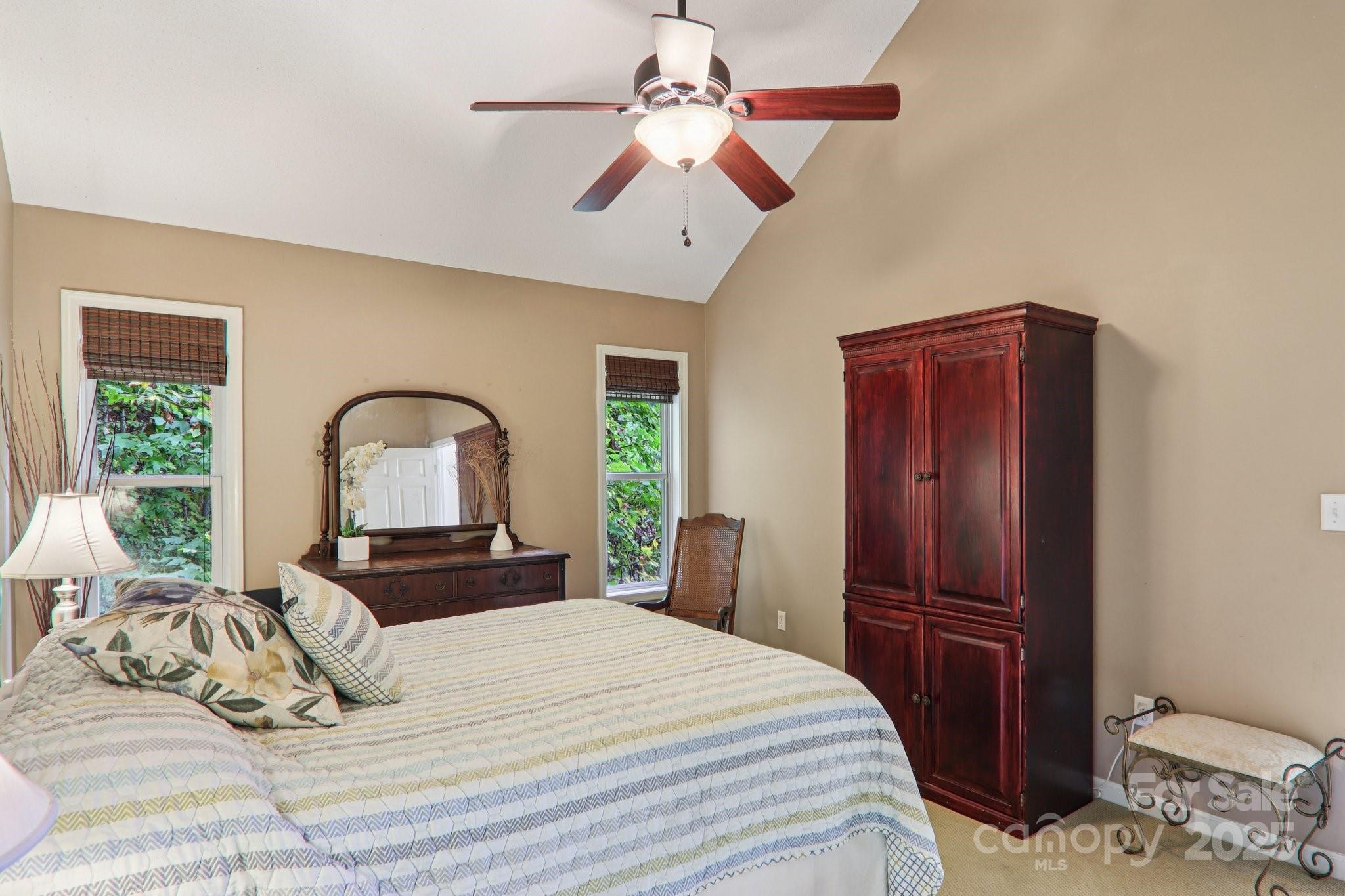 311 Jacks Knob Road Barnardsville, NC 28709 - Photo 32 of 48 a bedroom with a bed and a large window