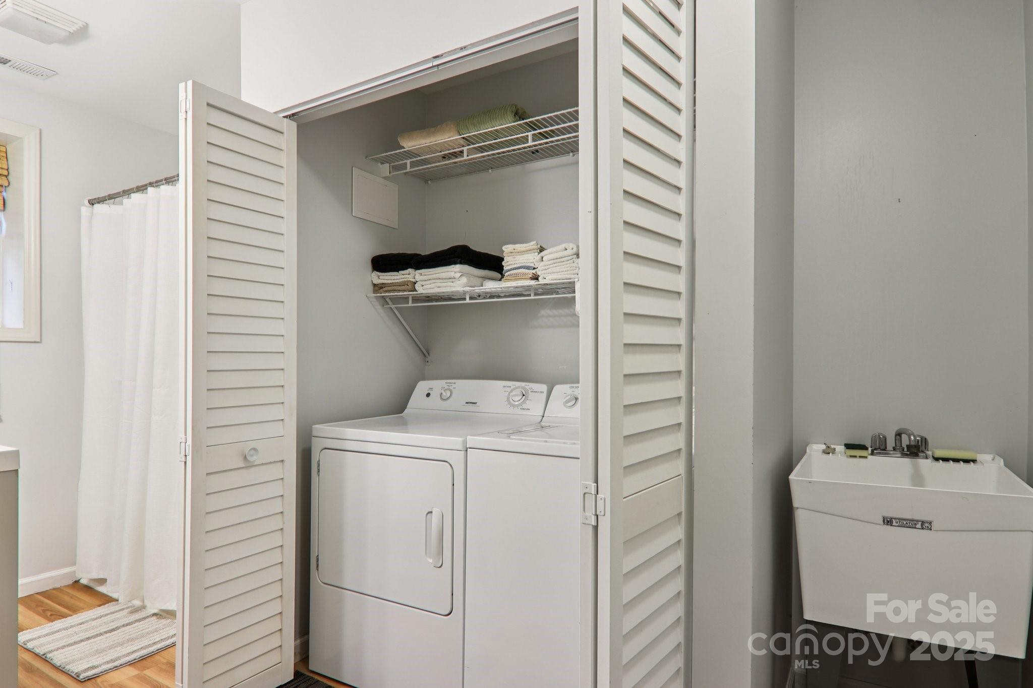 311 Jacks Knob Road Barnardsville, NC 28709 - Photo 42 of 48 a utility room with dryer and washer