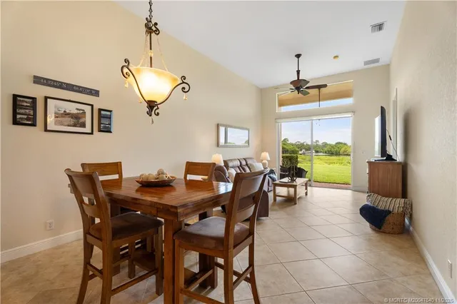 a view of walk in closet with clothes