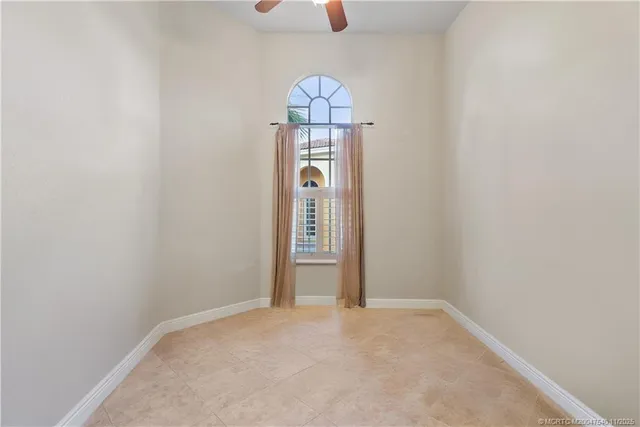 a view of a lake and green valley