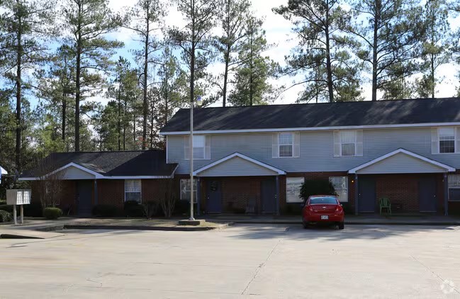 707 East Boyd Road Hogansville, GA 30230 - Photo 2 of 6 a front view of a house with a yard and garage