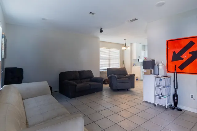 a living room with furniture and a couch