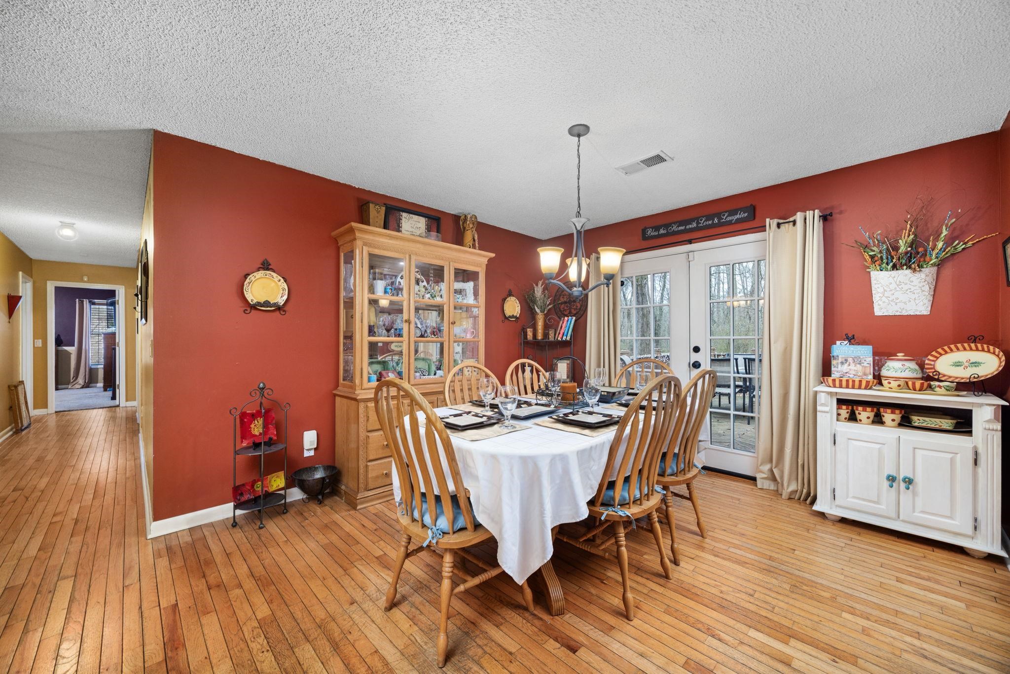 4625 Tucker Road Golden, MS 38847 - Photo 19 of 35 a view of a dining room with furniture window and wooden floor