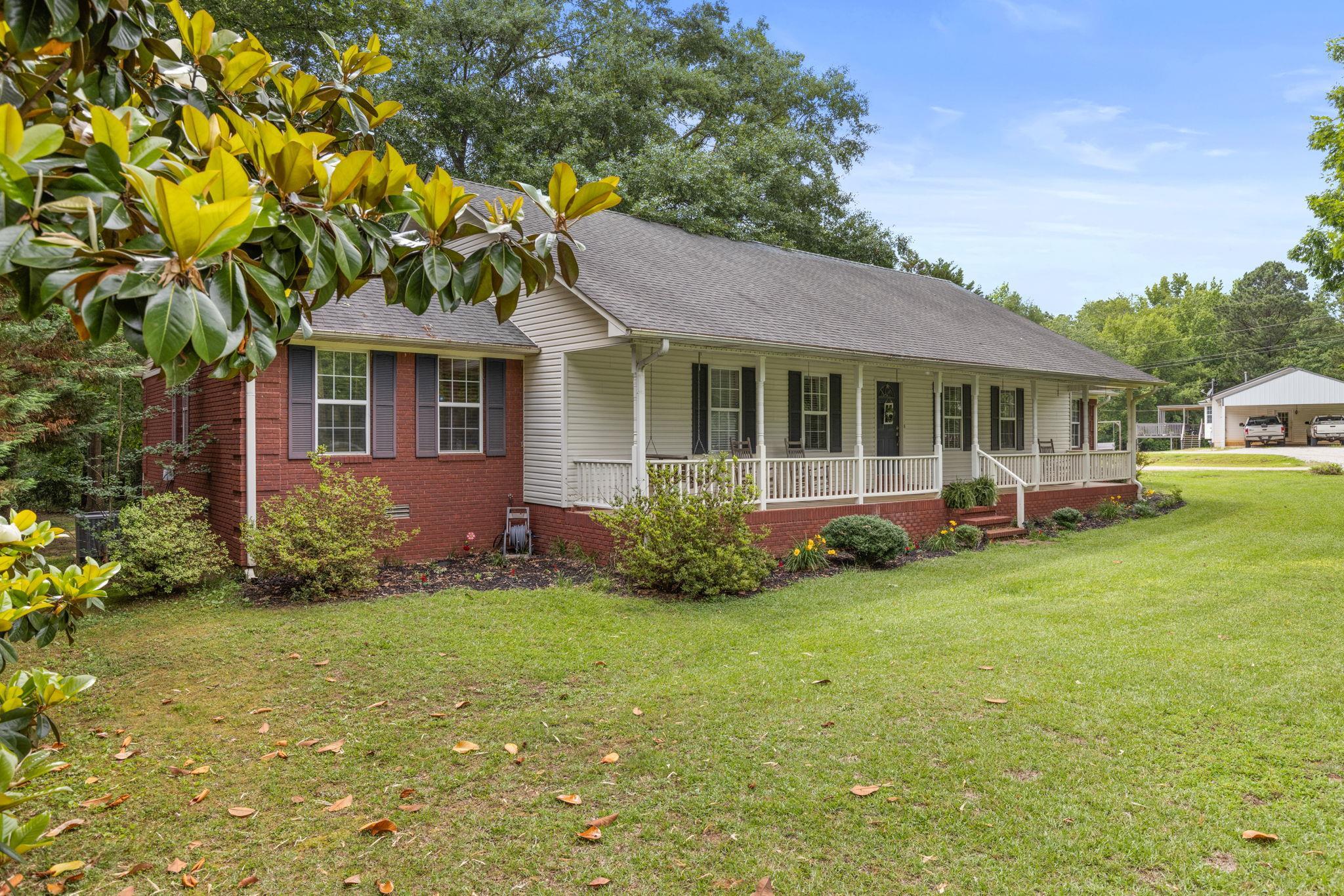4625 Tucker Road Golden, MS 38847 - Photo 2 of 35 a front view of a house with garden