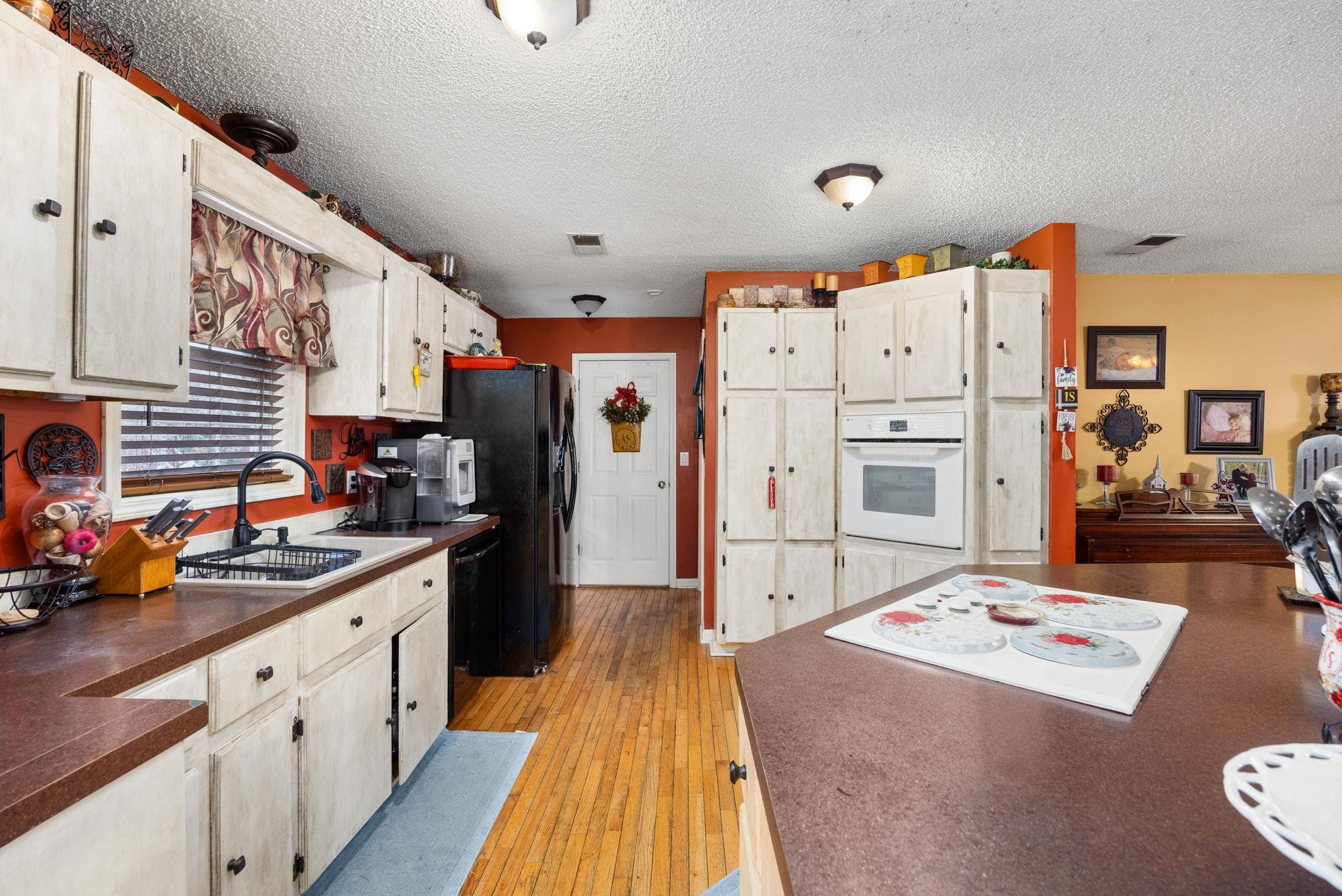 4625 Tucker Road Golden, MS 38847 - Photo 21 of 35 a kitchen with refrigerator and stove
