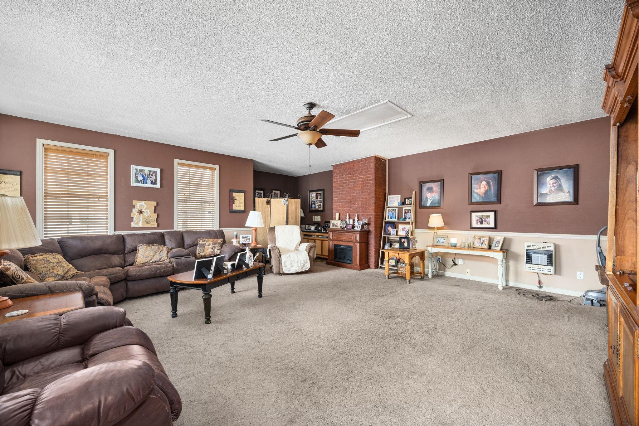 4625 Tucker Road Golden, MS 38847 - Photo 21 of 35 a living room with furniture and a large window