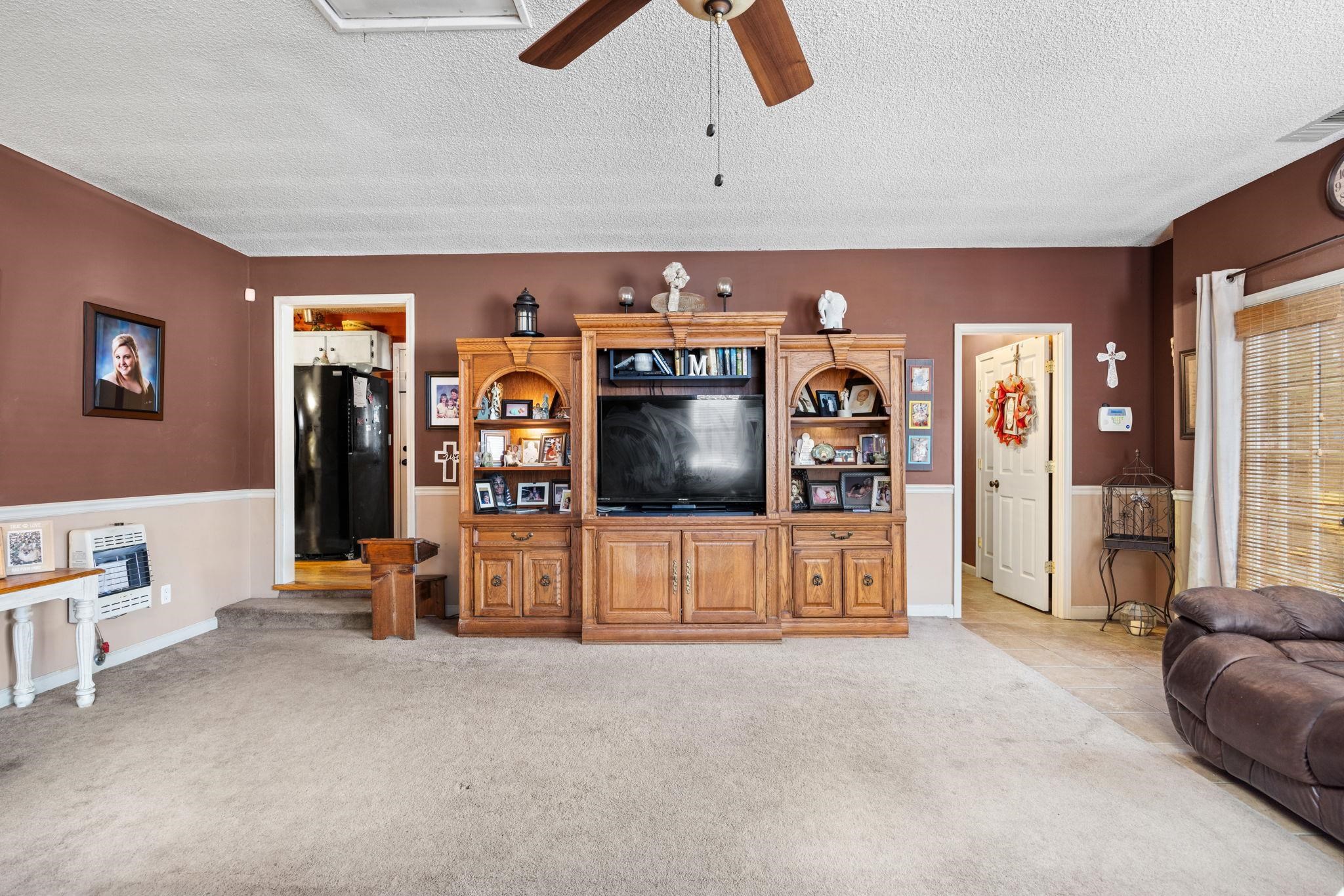 4625 Tucker Road Golden, MS 38847 - Photo 22 of 35 a living room with furniture and ceiling fan