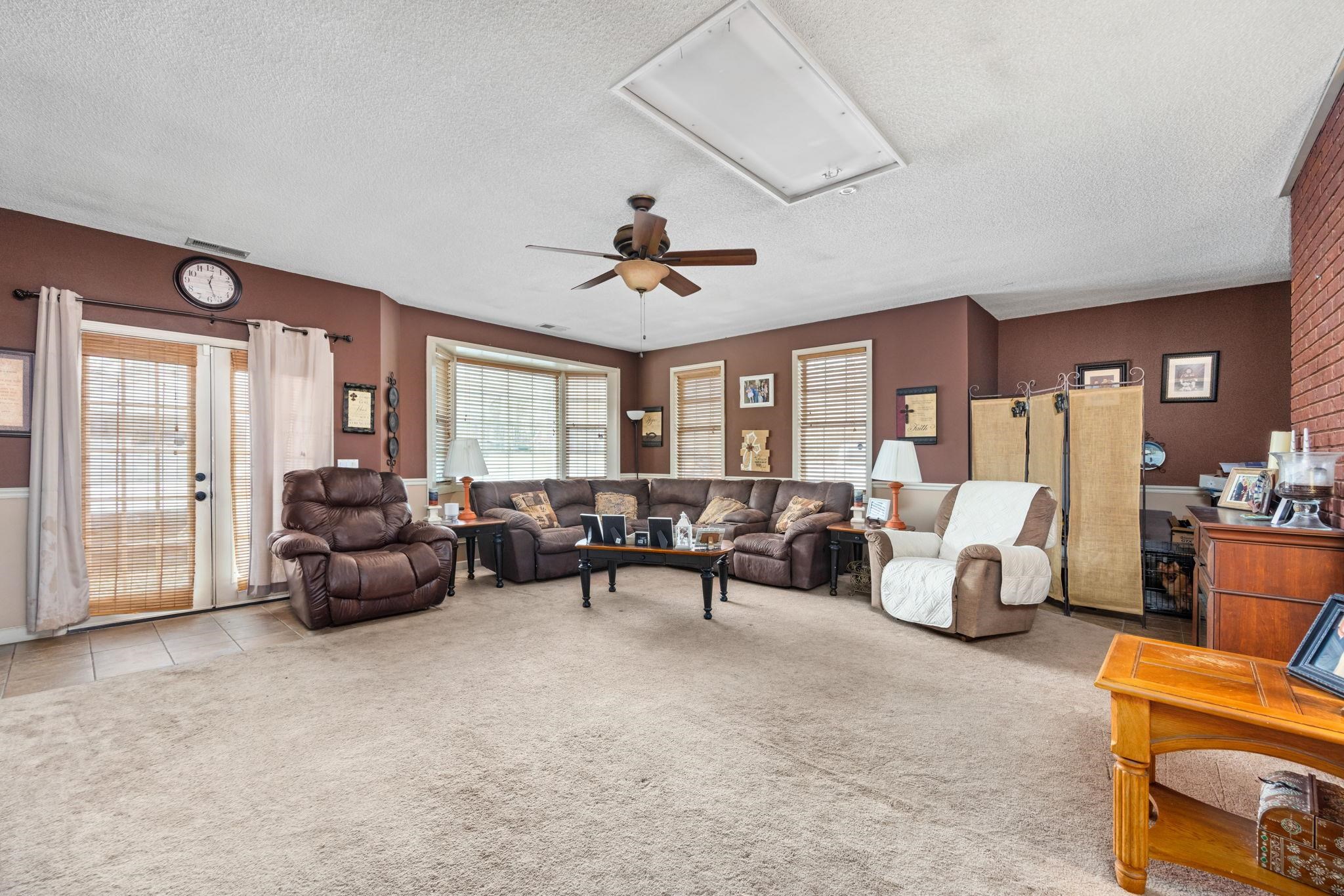 4625 Tucker Road Golden, MS 38847 - Photo 24 of 35 a living room with furniture and a large window