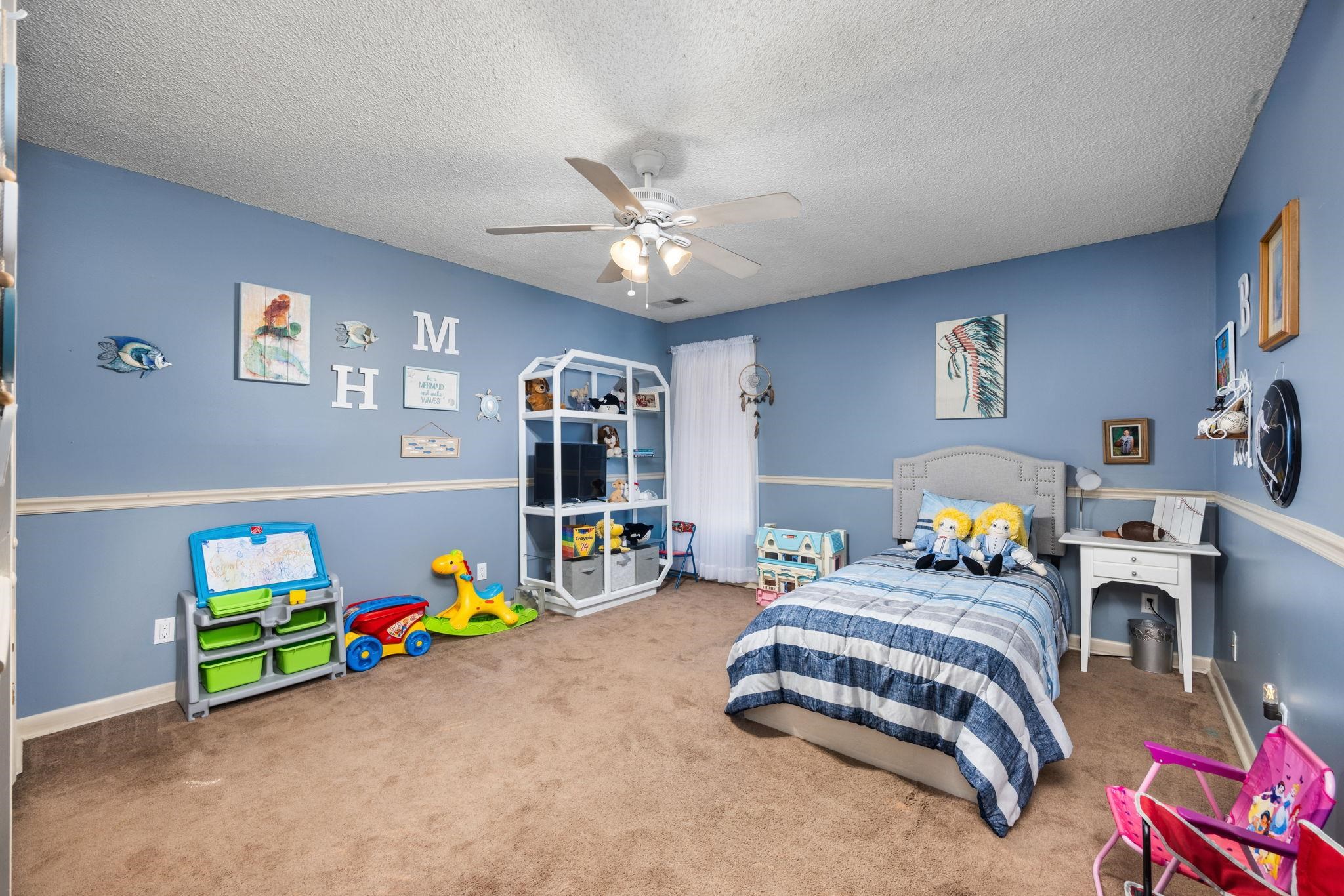 4625 Tucker Road Golden, MS 38847 - Photo 28 of 35 a bedroom with bed and a window