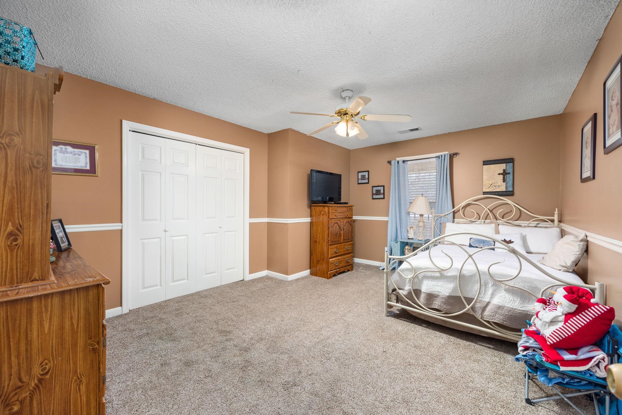 4625 Tucker Road Golden, MS 38847 - Photo 30 of 35 a bedroom with bed and windows