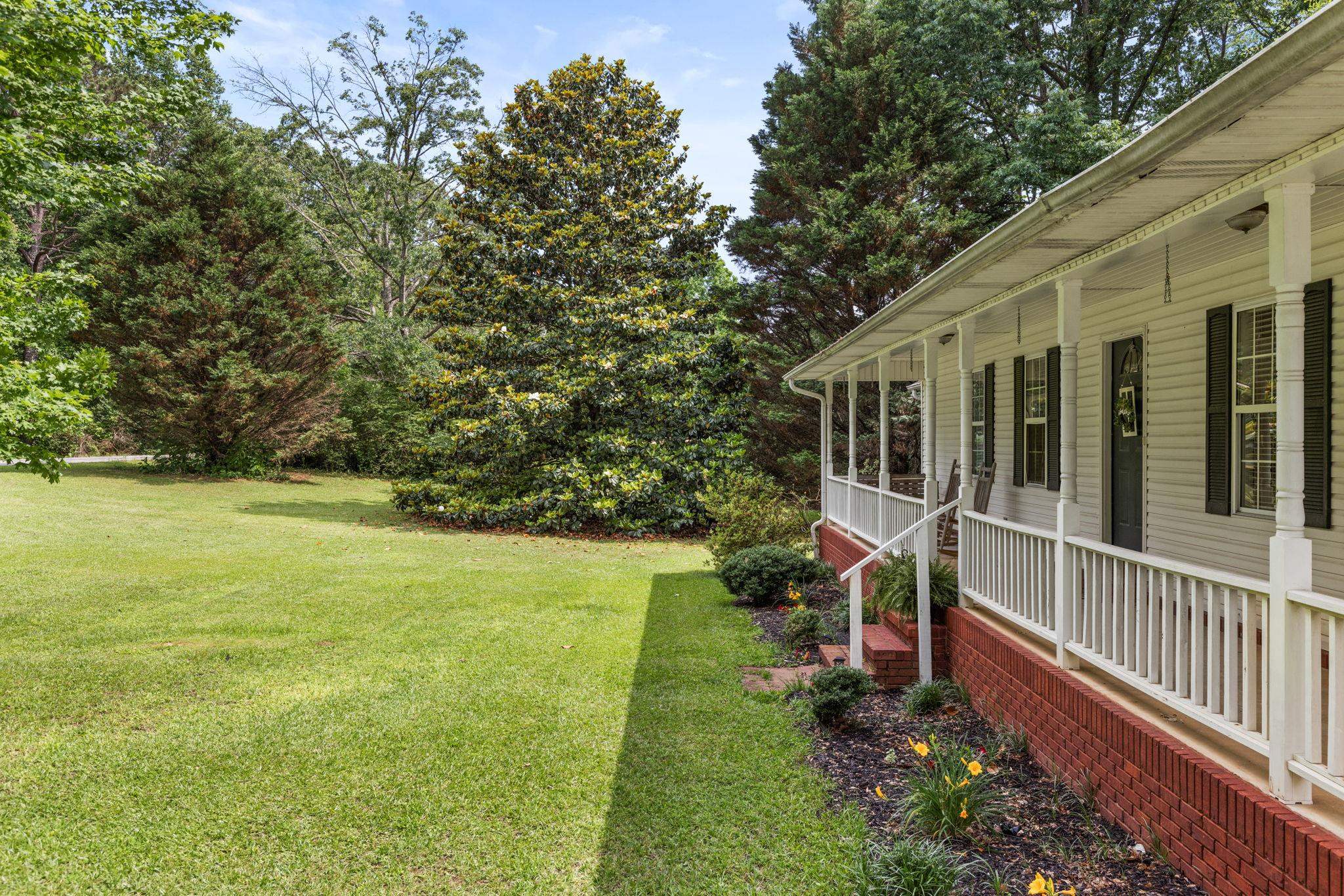 4625 Tucker Road Golden, MS 38847 - Photo 4 of 35 a view of a house with backyard and sitting area