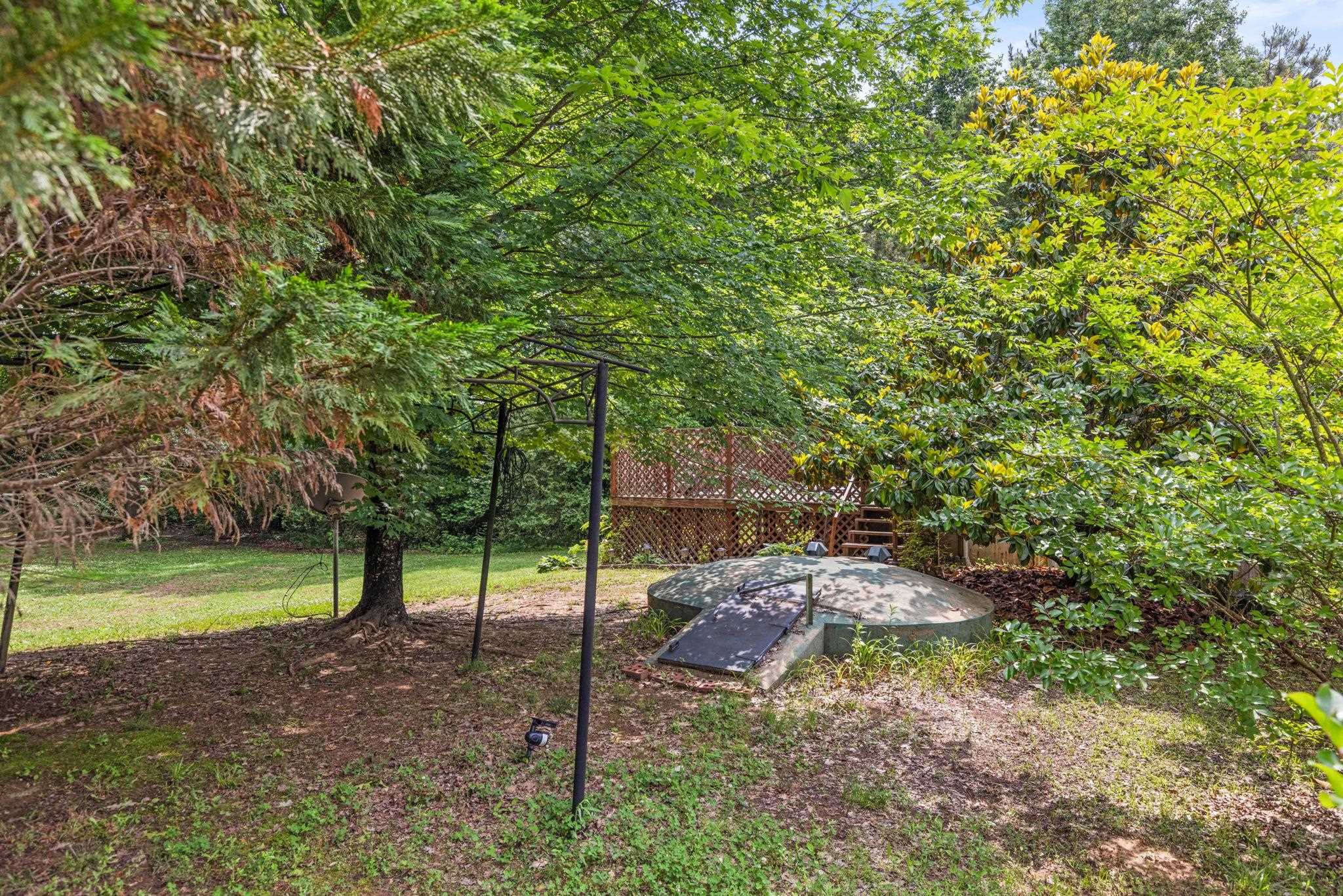 4625 Tucker Road Golden, MS 38847 - Photo 5 of 35 a backyard of a house with a yard and outdoor seating