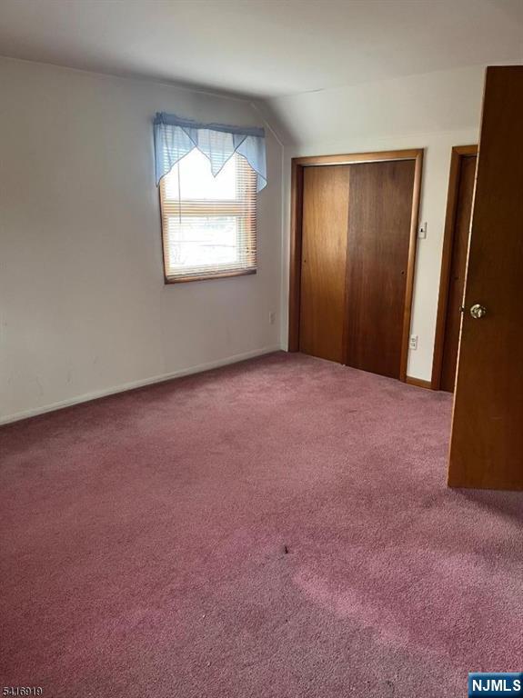 24 Stony Hill Road Clifton, NJ 07013 - Photo 11 of 17 an empty room with windows