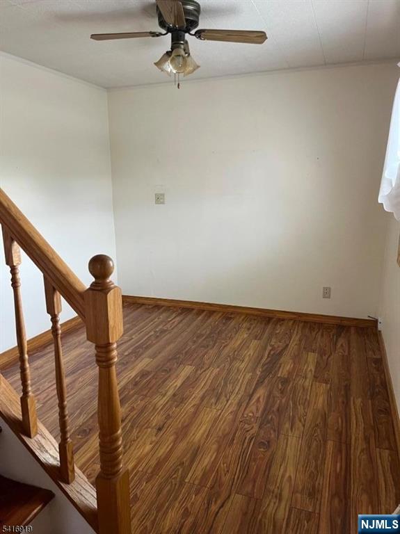 24 Stony Hill Road Clifton, NJ 07013 - Photo 3 of 17 a view of empty room with stairs and wooden floor