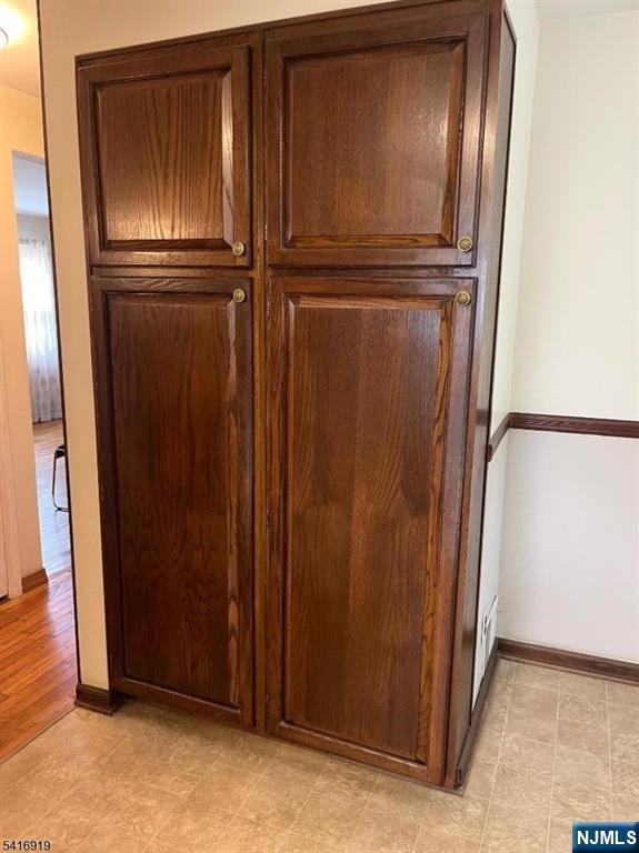 24 Stony Hill Road Clifton, NJ 07013 - Photo 7 of 17 an empty room with wooden door