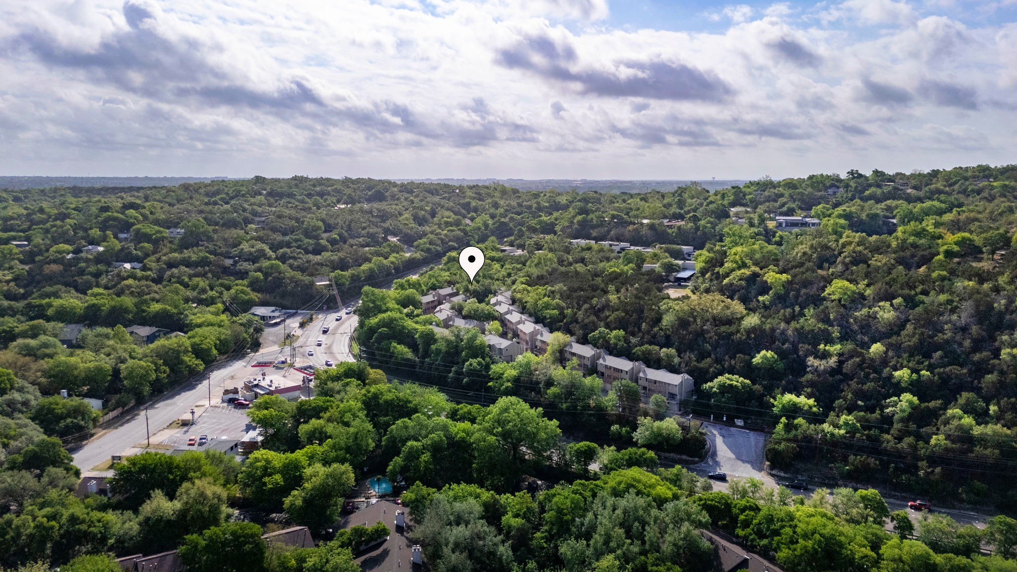 3845 Ranch Road 2222, Unit 19 Austin, TX 78731 - Photo 35 of 38 a view of a city with green space