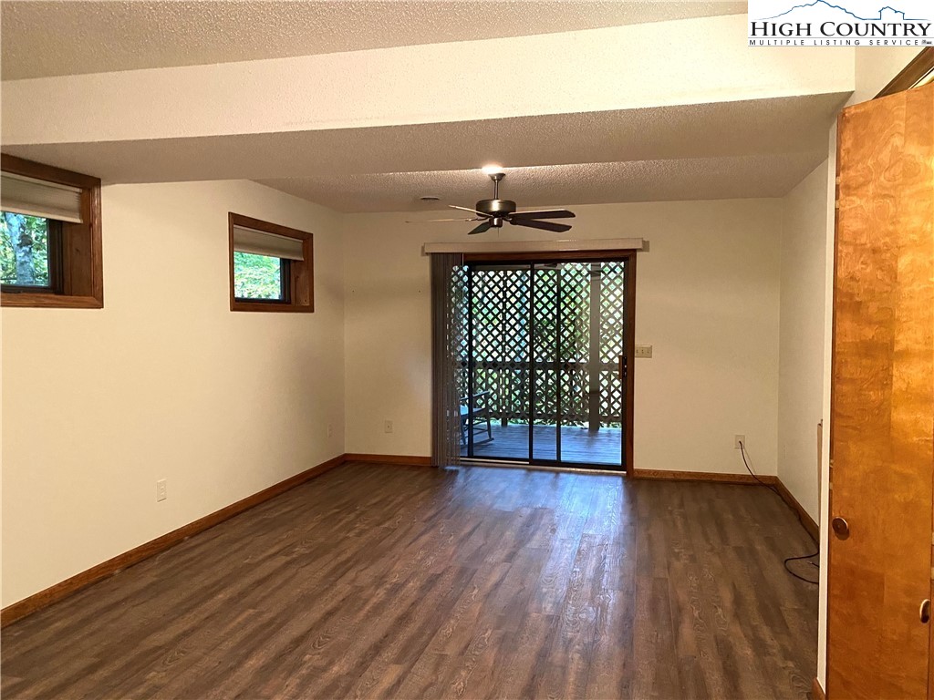 33 Goldfinch Road Newland, NC 28657 - Photo 29 of 29 wooden floor in an empty room with a window
