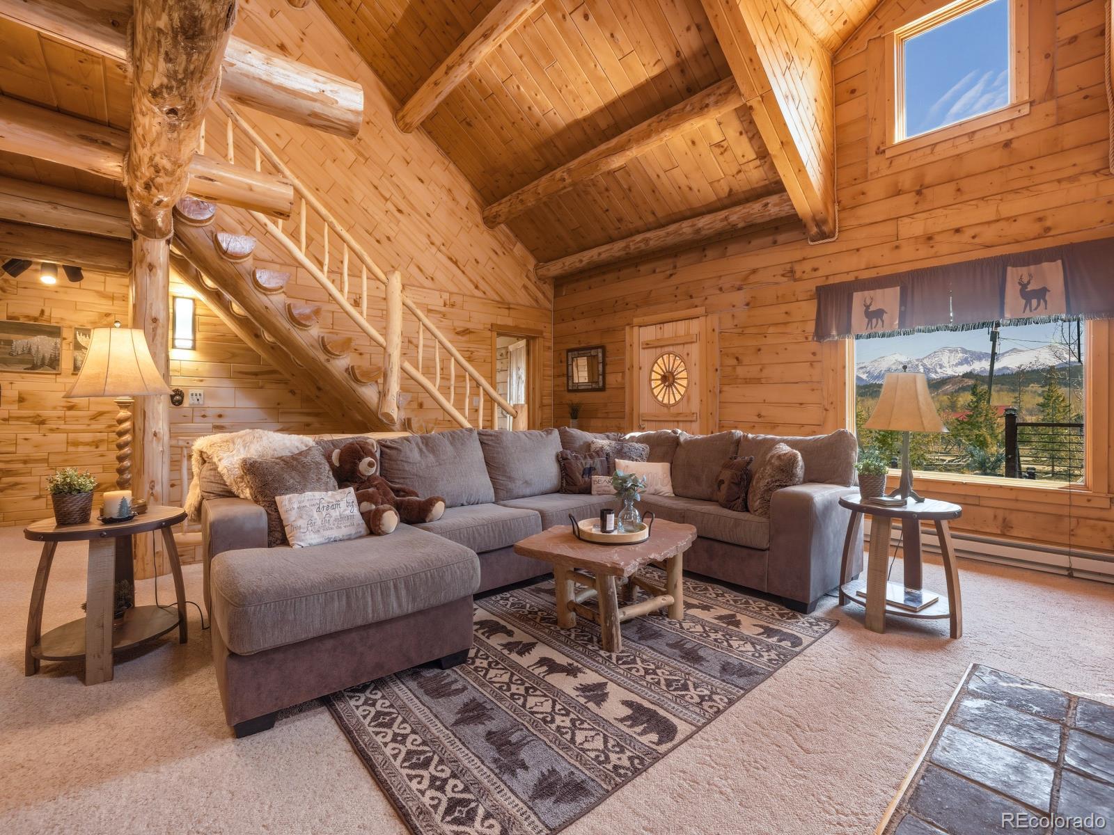 341 Anderson Road Walden, CO 80480 - Photo 23 of 50 a living room with furniture and a large window