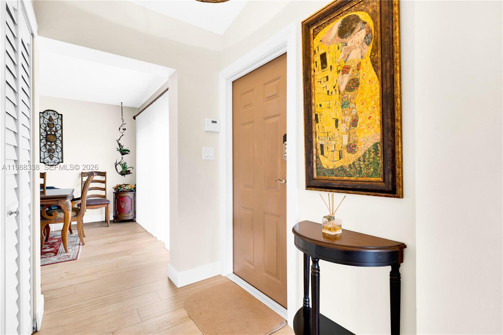 10909 Southwest 113th Place, Unit 68A Miami, FL 33176 - Photo 11 of 37 a bathroom with a sink and a mirror