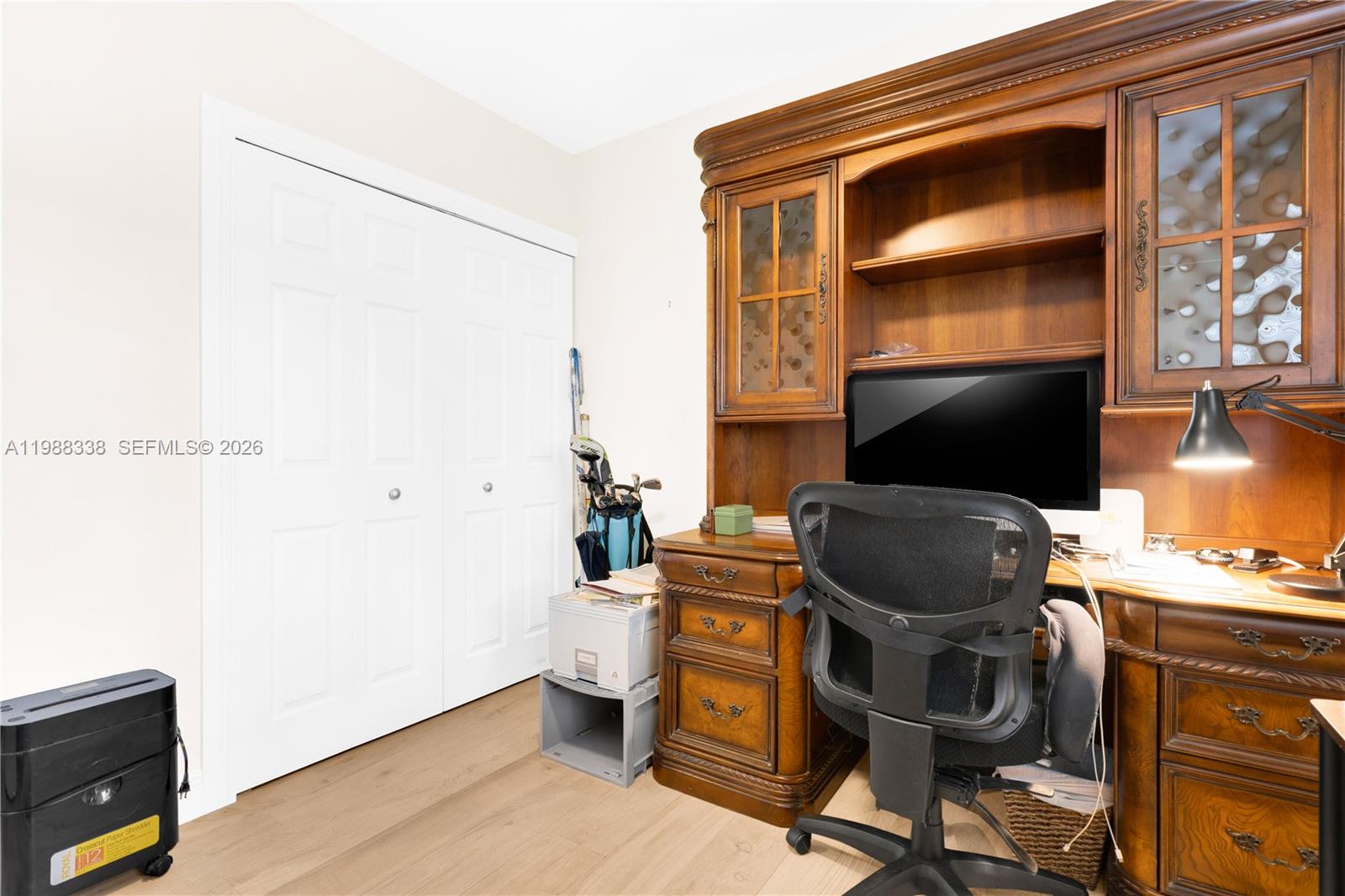 10909 Southwest 113th Place, Unit 68A Miami, FL 33176 - Photo 26 of 37 a view of workspace with wooden floor windows