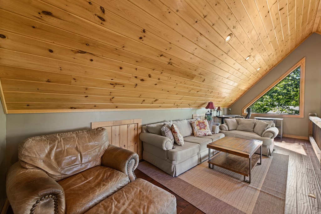 479 Big Timber Road Mineral Bluff, GA 30559 - Photo 29 of 60 a roof deck with couch and wooden floor