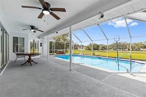 10446 Baylor Drive Spring Hill, FL 34608 - Photo 29 of 32 a view of an indoor swimming pool